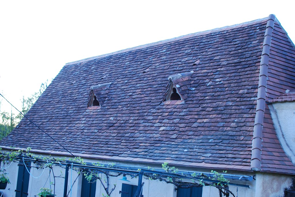 Professional roofing installation showing quality workmanship and safety standards